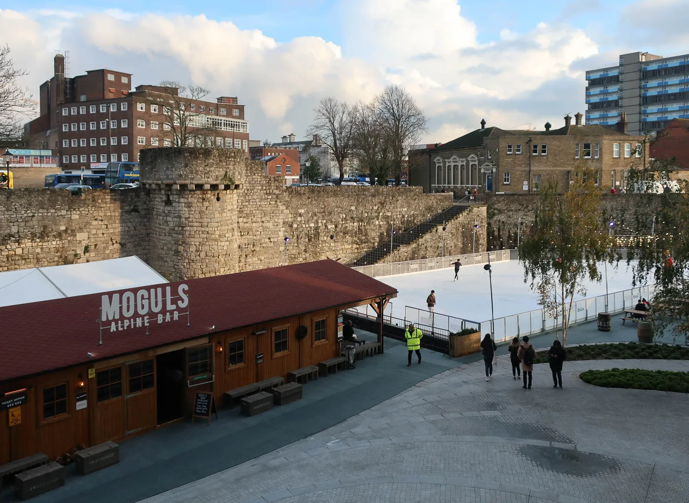 The seasonal ice rink outside Westquay, beside Southampton's medieval town walls; the bar shown belonged to an earlier operator